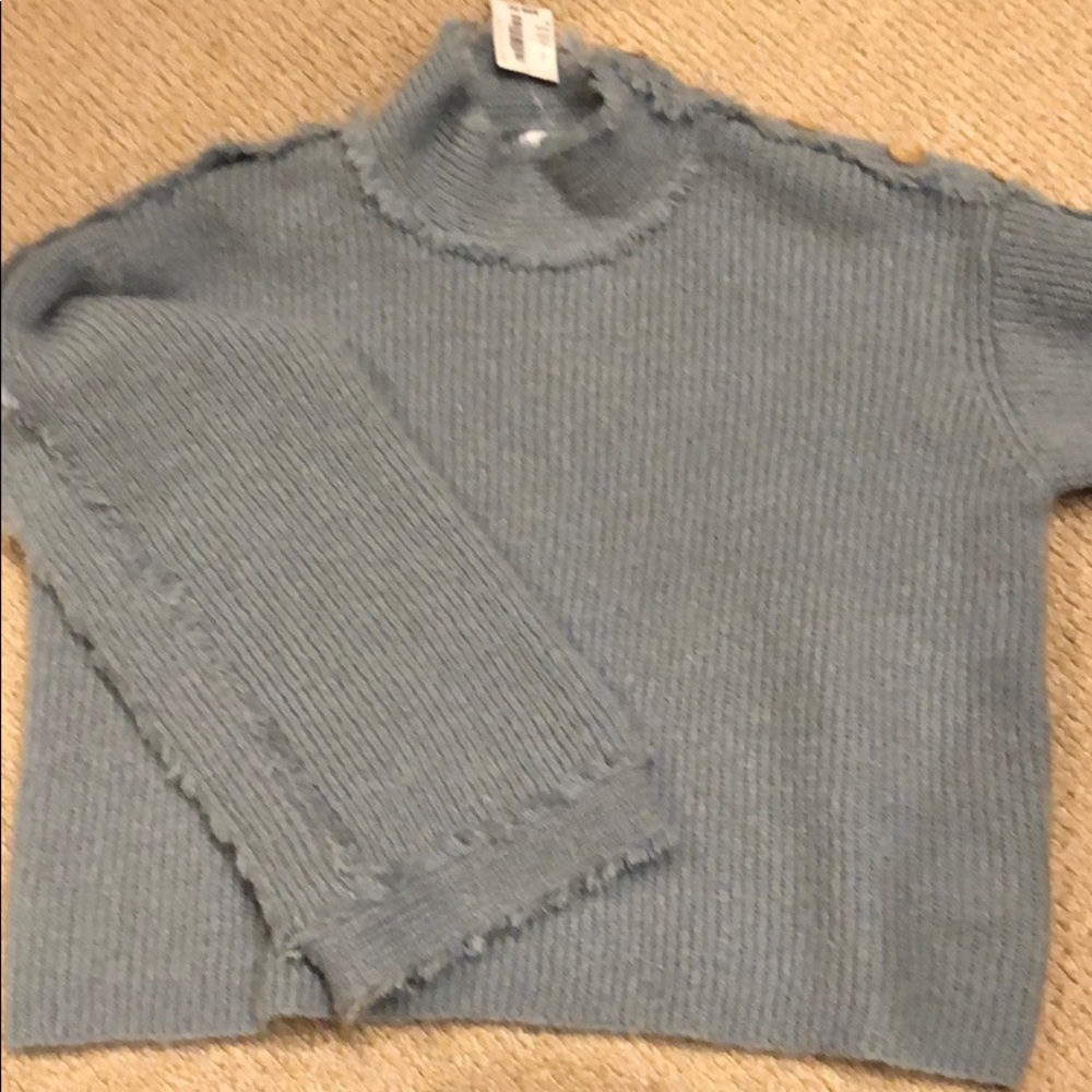 Light blue — not grey - sweater with bell sleeves